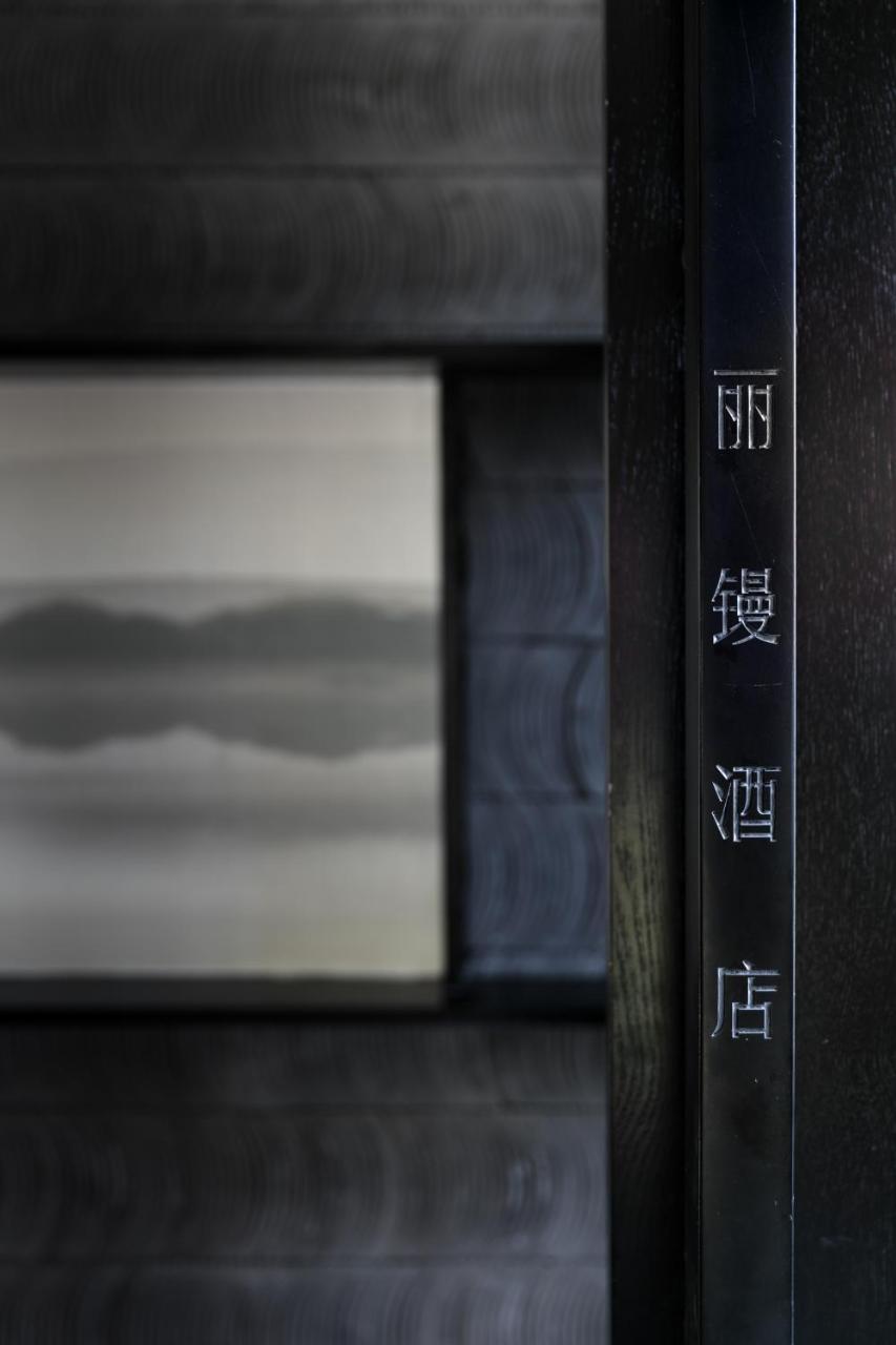 Lijiangl Hotel Liman Shenmiji Inn ลี่เจียง ภายนอก รูปภาพ